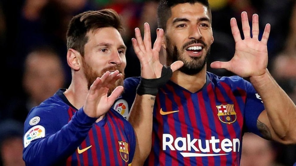 Messi và Suarez thời còn là đồng đội tại Barca. Ảnh: EFE