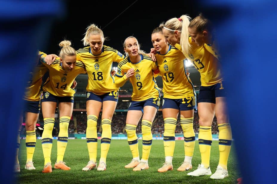 Swedish captain Kosovare Asllani talks to her teammates prior to playing Japan.