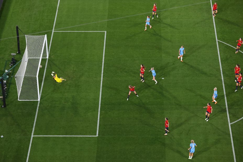 A shot from England's Lauren Hemp hits the crossbar in the first half.